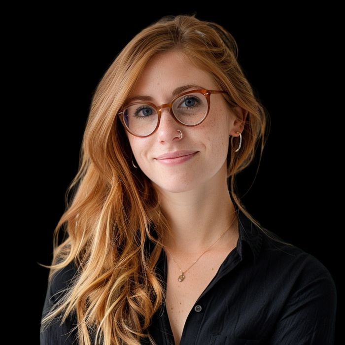 Journalist writing article on laptop
